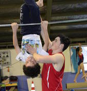 Let our coaches teach you to circle up on high bar and swing down again