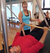 1-1 Pilates training on the Cadillac